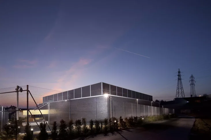 Exterior view of the Crissier datacenter with infrastructure and technical equipment visible